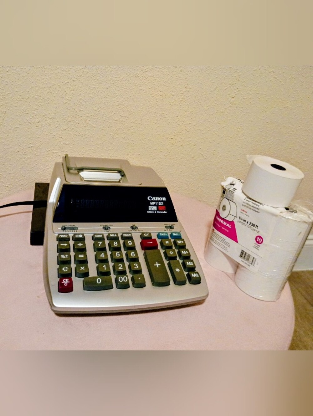 Canon MP11DX 12-digit desktop printing calculator featuring a